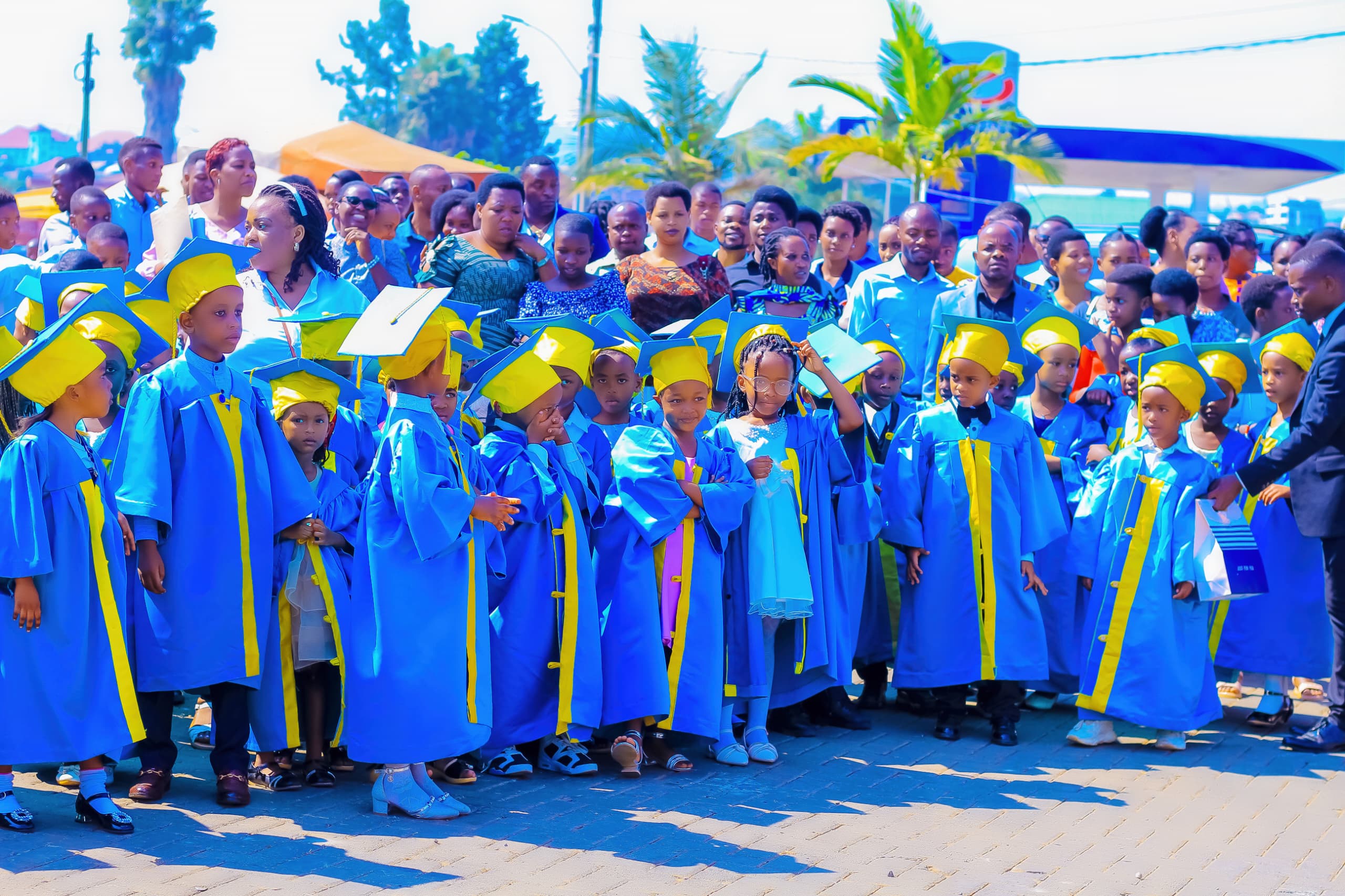 Students at Le Bambin de Saint Joseph School wearing graduation caps